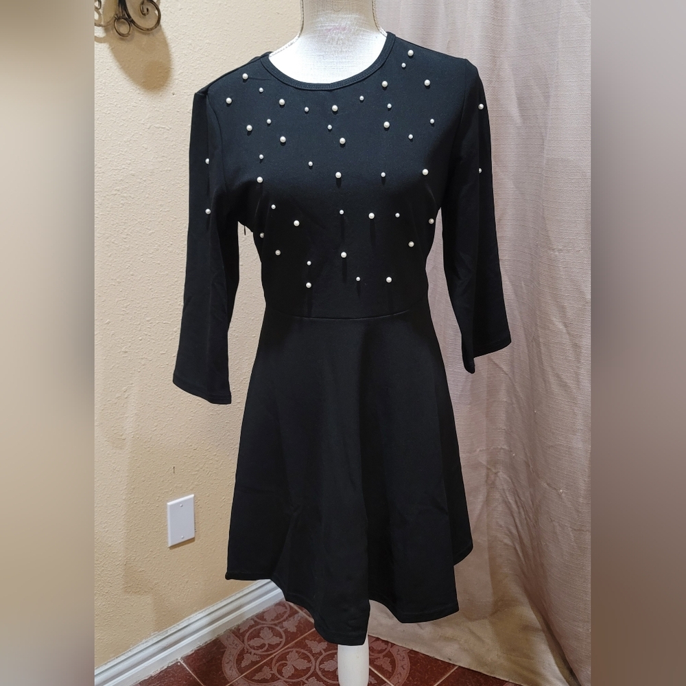 Dress over the knee 3/4 sleeve lenght